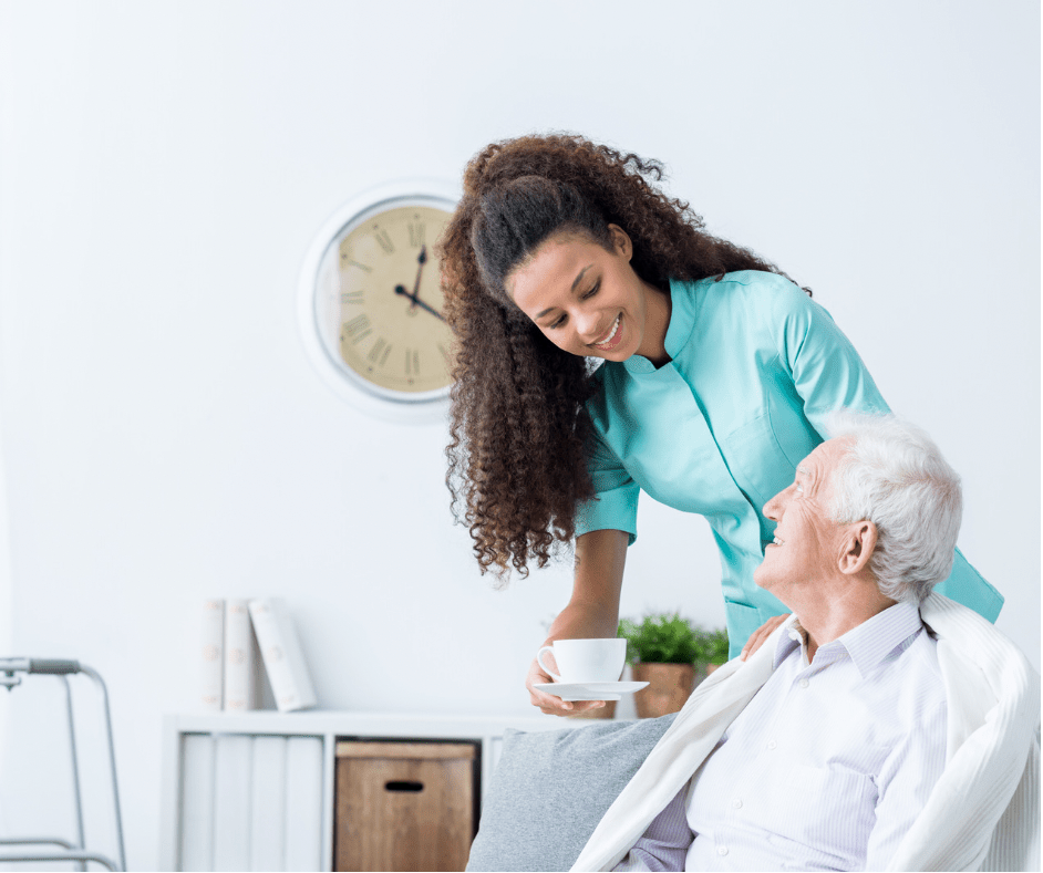 Home Care Service Locations | Loving Hands Homecare Agency Compassionate caregiver serving a drink to an older adult at home