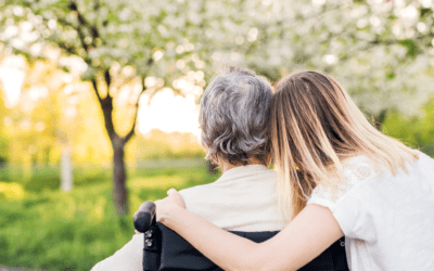 Family caregiver spending quality time with an older adult receiving respite care.